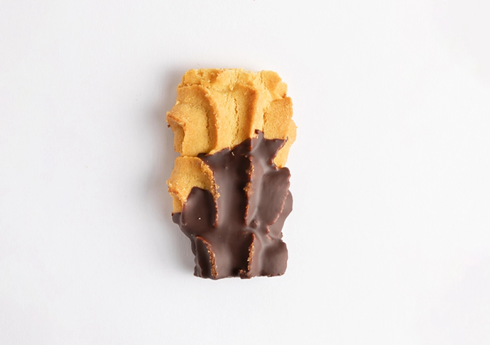 Chocolate-dipped Spritz Cookie